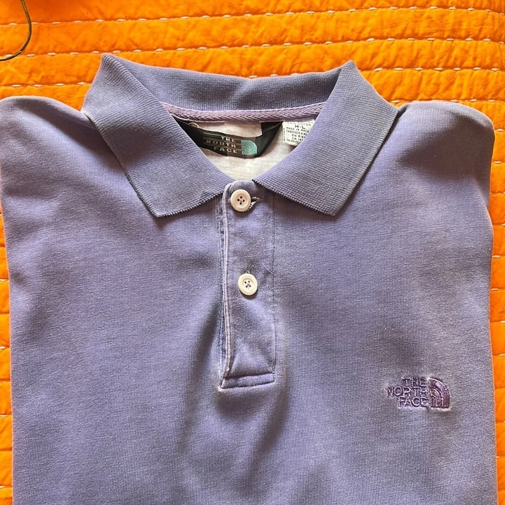 The North Face lavender short sleeved polo SZ M/L
